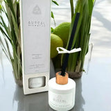 Aureal lemongrass and bergamot reed diffuser in a white bottle with black reeds and its box