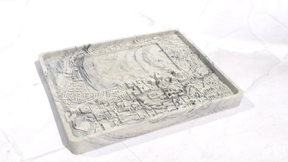 Empty grey marbled Harland and Wolff candle base with a raised street map and the Aureal logo