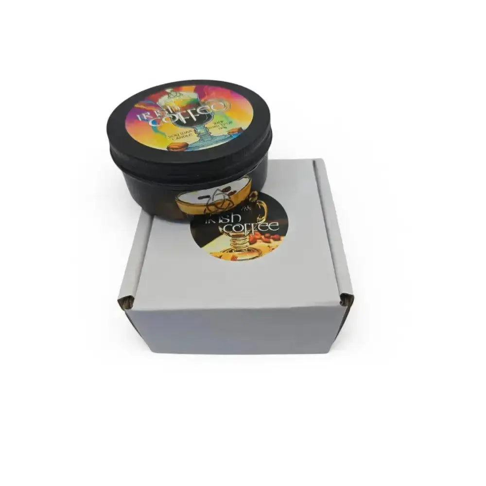 Irish Coffee candle tin on a grey mailer box with a round sticker