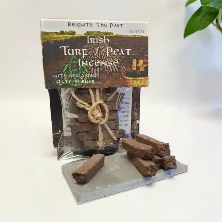 Irish Turf Peat Incense pack with reclaimed slate burner, and turf sods stacked on the slate beside it