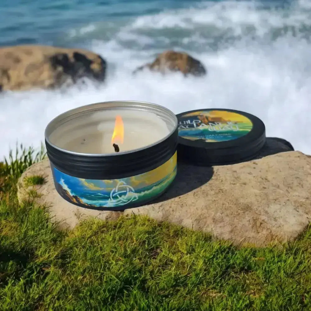 candle beside splashing coastline